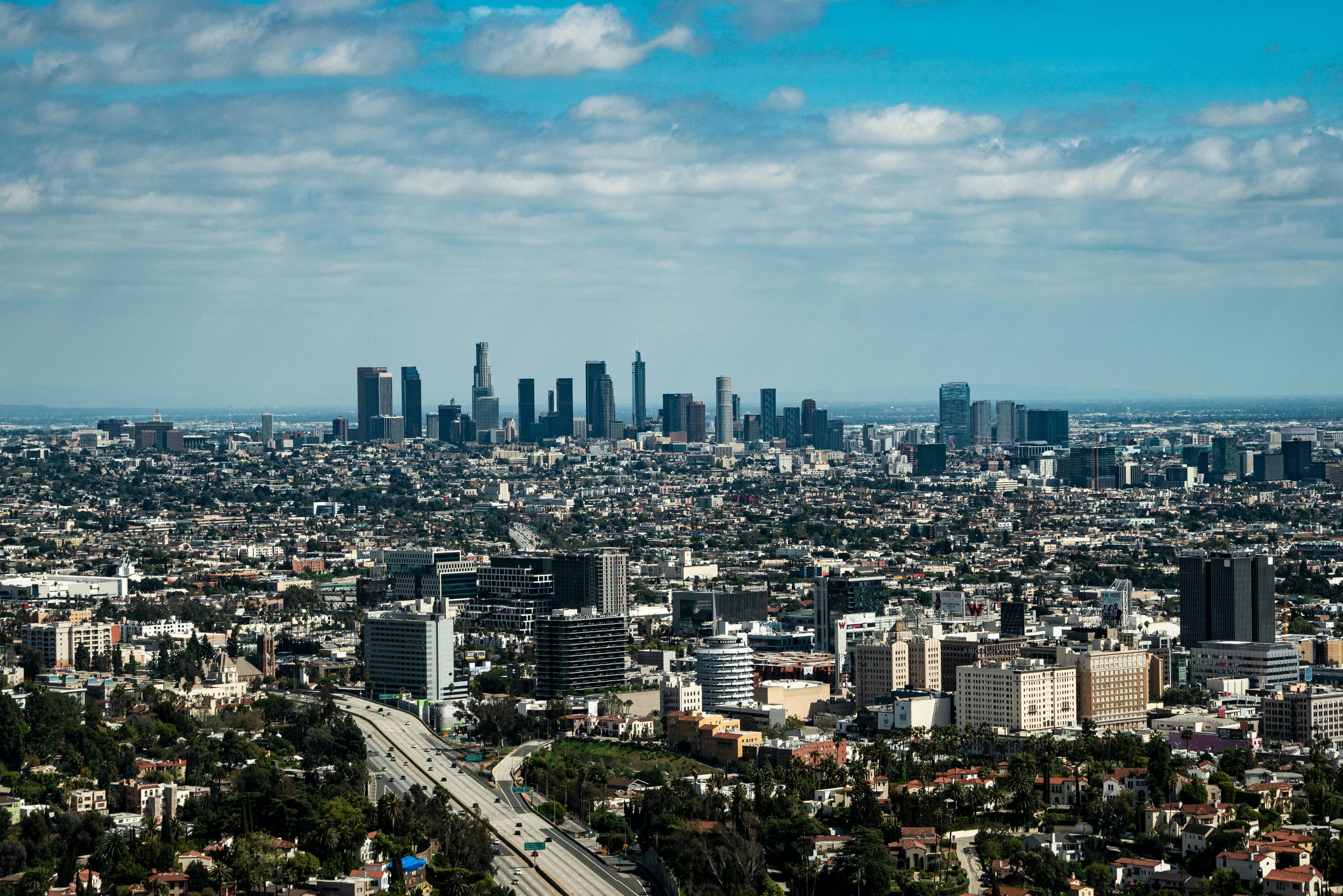 Wide view of Los Angeles downtown and skyline. Photo by Anthony Brown: https://www.pexels.com/photo/city-with-high-rise-buildings-under-blue-sky-4609912/